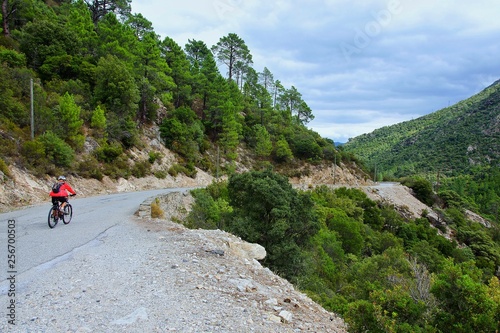 Corsica-cyclist in the canyon river Golo