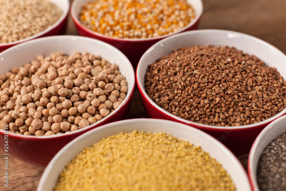 Various seeds and grains in bowls - close up Various seeds and grains in bowls - close up
