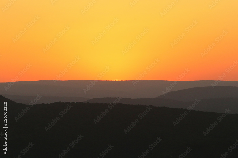 Abstract sunset scene with shades of oranges and greys. Abstract sunset scene with shades of oranges and greys.