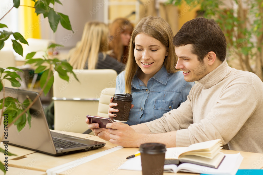 Young beautiful couple working on a laptop together copyspace coffee drinking coworkers colleagues students studying education technology internet online lifestyle positivity project businesspeople Young beautiful couple working on a laptop together copyspace coffee drinking coworkers colleagues students studying education technology internet online lifestyle positivity project businesspeople