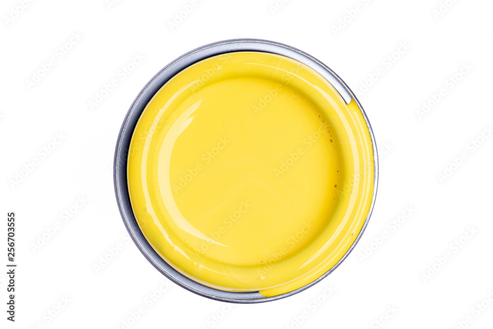 Can lid with yellow paint isolated on white background, top view Can lid with yellow paint isolated on white background, top view