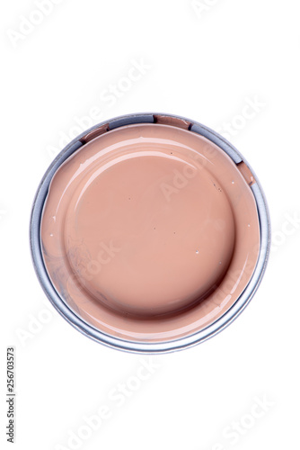Can lid with brown chocolate paint isolated on white background, top view