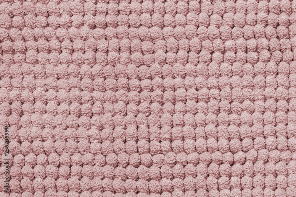 Pink texture. Closeup of a light seamless pink fluffy terry bath towel texture background for design and text. Macro. Pink texture. Closeup of a light seamless pink fluffy terry bath towel texture background for design and text. Macro.