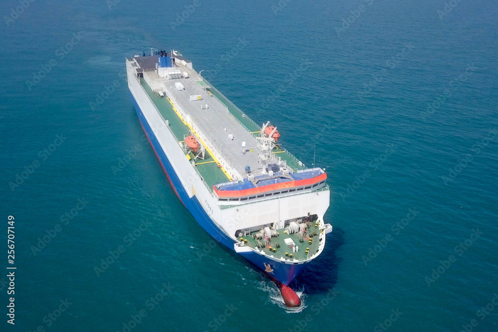 Aerial image of a Large RoRo (Roll on/off) Vehicle carrier vessel cruising the Mediterranean sea