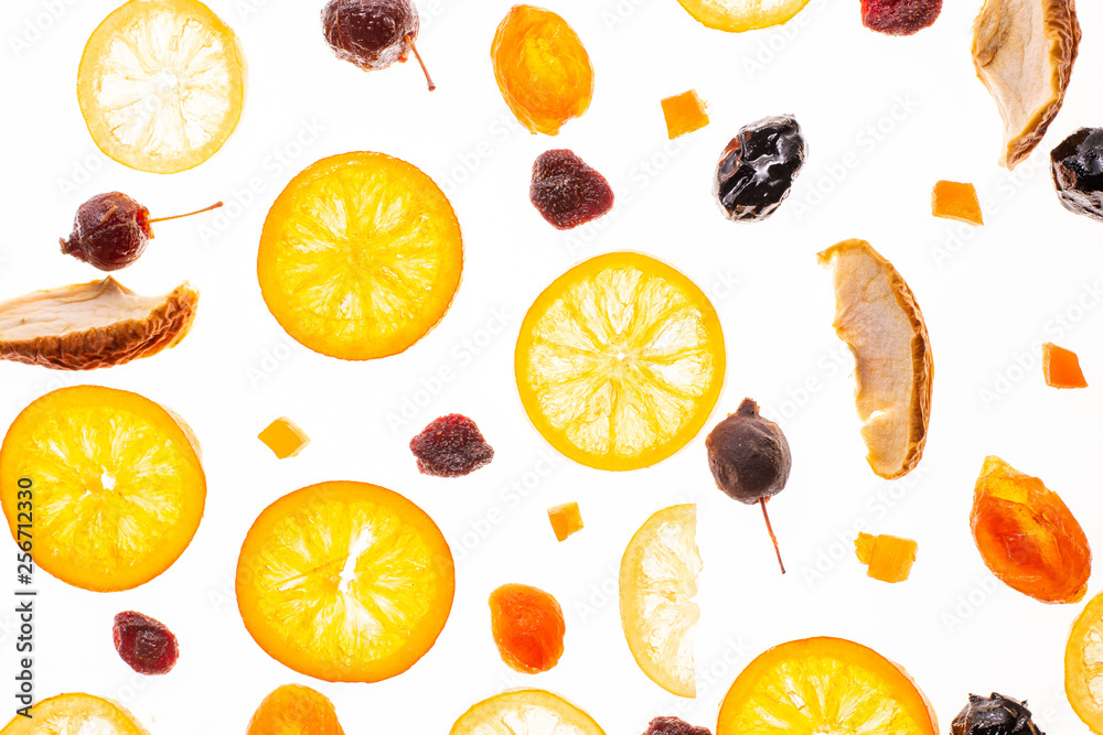 Sweet candied fruit isolated on a white background. Flat lay, top view. Fruit composition Sweet candied fruit isolated on a white background. Flat lay, top view. Fruit composition