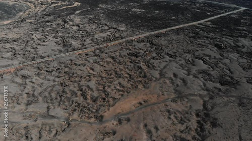 Ground surface coated frozen lava aerial view photo