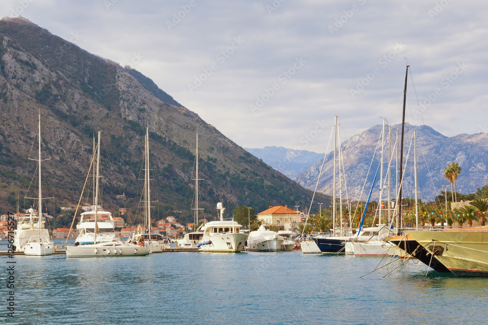 Beautiful Mediterranean landscape. Montenegro, Adriatic Sea, Bay of Kotor. Harbor for yachts near Old Town of Kotor on a winter day
