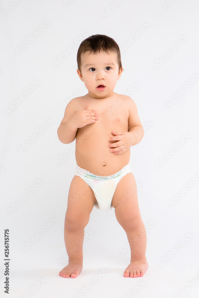 baby boy in diapers on white background, Infant baby boy in diaper