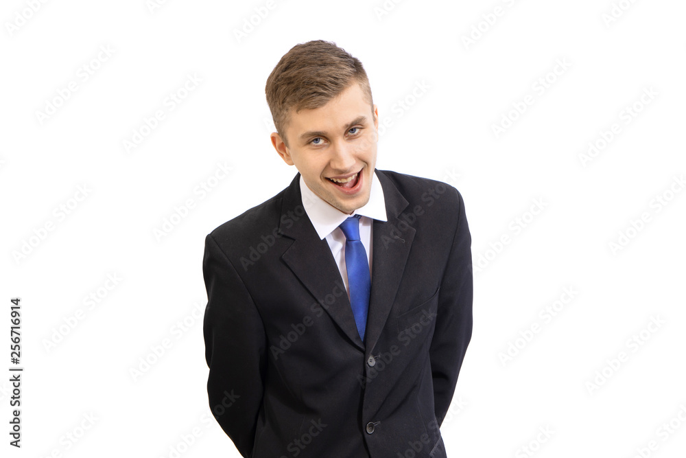Portrait of funny young attractive business man in a dark suit and a bright blue tie, isolated on white Portrait of funny young attractive business man in a dark suit and a bright blue tie, isolated on white
