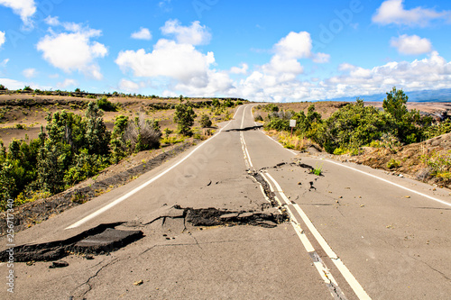 The Damaged asphalt road Crater Rim Drive in the Hawaii Volcanoes National Park after earthquake and eruption of Kilauea