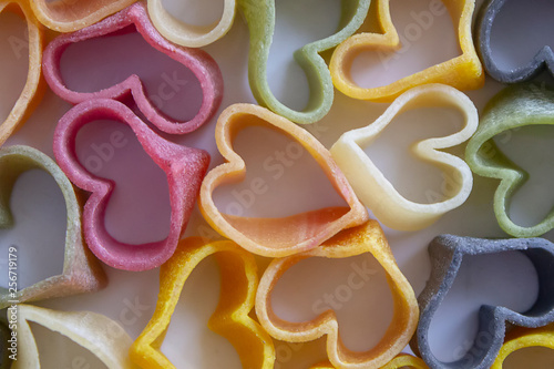 pasta in the form of hearts, different colors, before cooking