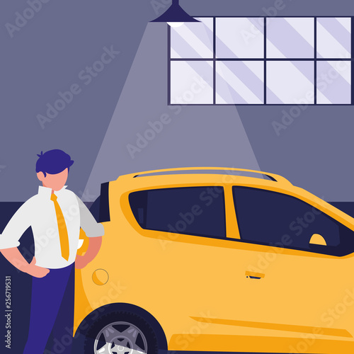 businessman with car in the workshop