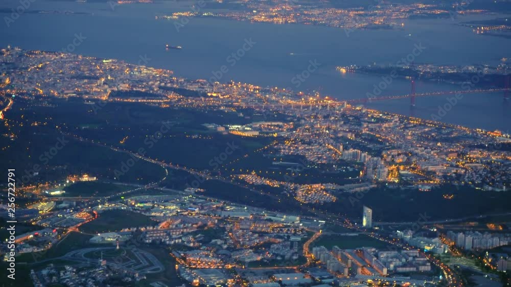 Aerial view of 25 April Bridge, Lisbon. Both river banks of tagus. Montijo Monsanto Barreiro Cacilhas Almada, A5 cascais highway and lighthouse of mama