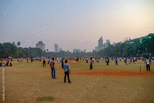 Cricket played on Oval maidan in Mumbai, India