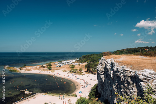 View of the coast of Gotland and people on the beach photo