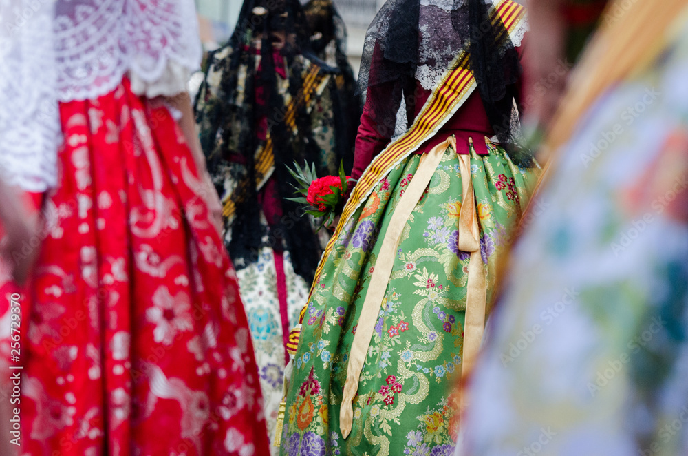 Falleras dress traditional with flowers, Spain, Valencia. Fashion fallas festival in Valencia.