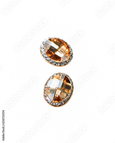 Pair of diamond stud earrings on white