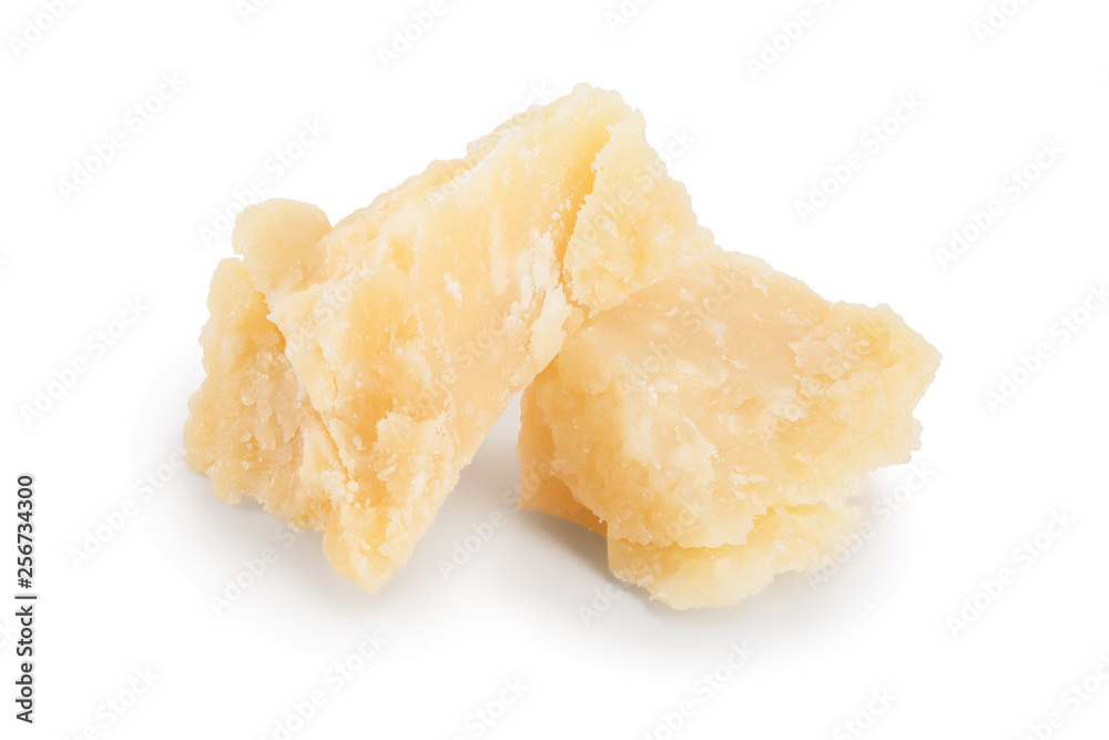 Parmesan cheese pieces isolated on white background. Closeup Parmesan cheese pieces isolated on white background. Closeup