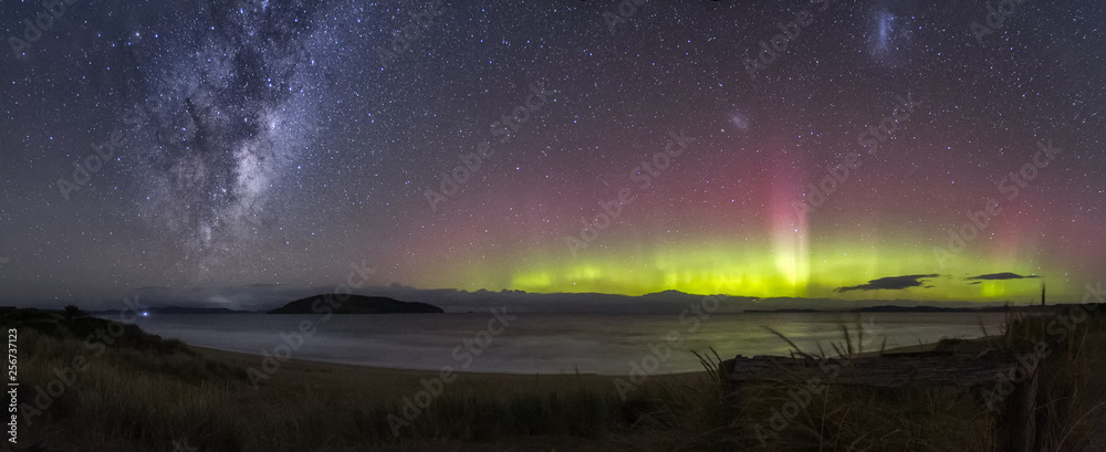 Beautiful display of the Aurora Australis or Southern Lights with the galactic centre of the Milky Way