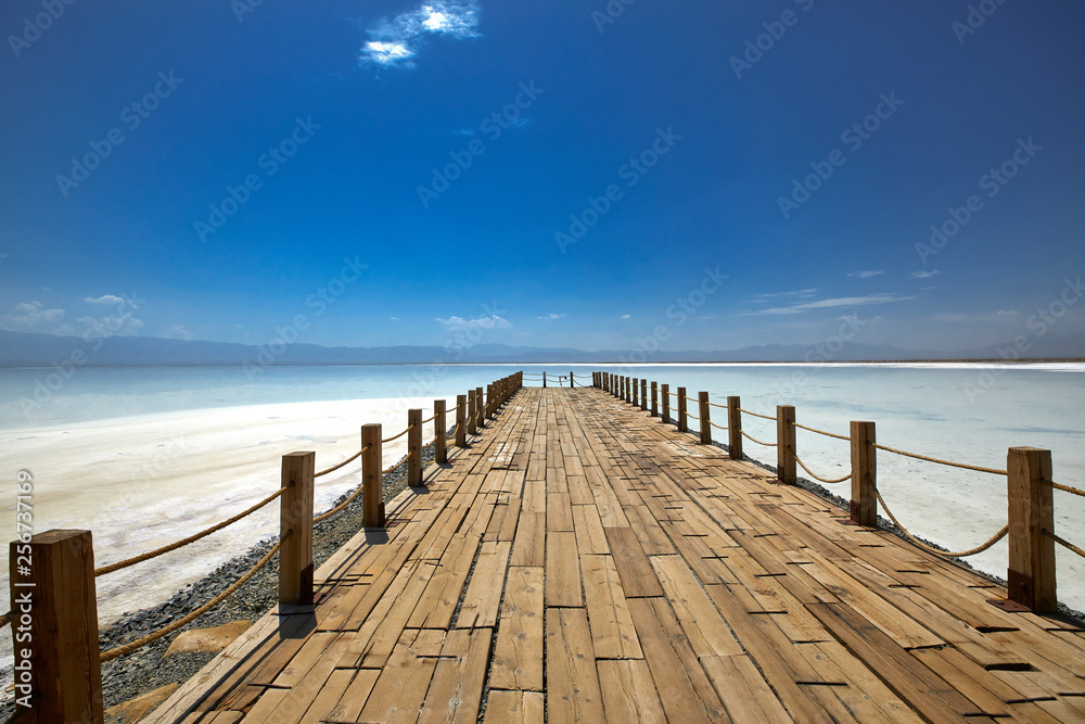Wooden bridge on the shore of the salt lake