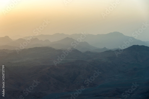 Middle East or Africa  picturesque bare mountain range and a large sandy valley desert landscapes landscape photography