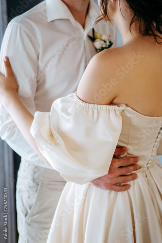 Two young lovers getting ready for the wedding