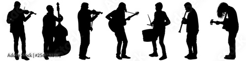 Silhouettes of street musicians playing instruments