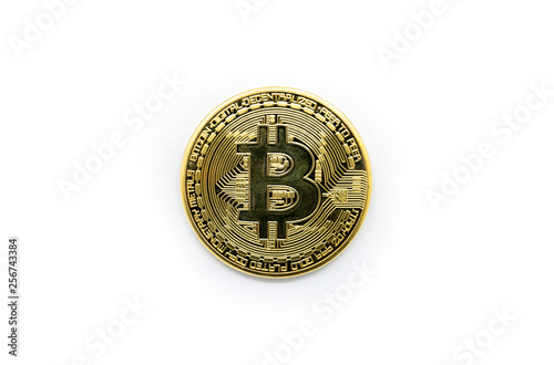 Physical gold Bitcoin isolated against a white background