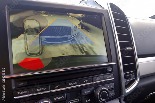 Wallpaper Mural Rearview camera with dynamic trajectory turning lines and parking assistant. Driver assistance systems for parking. View of the monitor. Torontodigital.ca