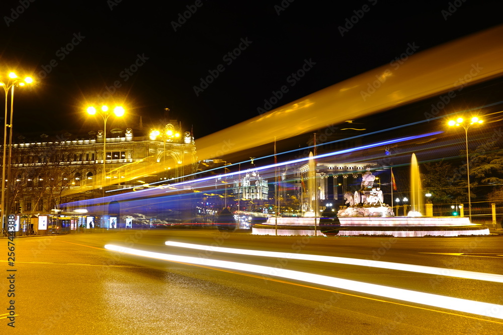 Fototapeta premium Cibeles fountain in Madrid. Night traffic in Madrid. Spain. Fountain is built in 1782.