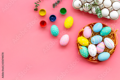 Traditional Easter eggs for paint on pink background top view space for text