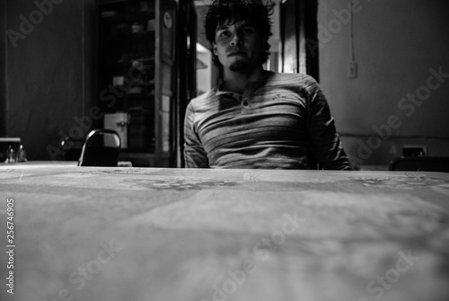 Self portrait, man waiting for his food, table, kitchen and food