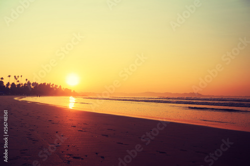 Beautiful tropical beach in the sunrise
