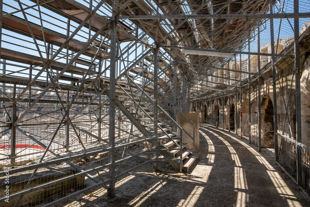 Scaffolding for the seating inside the Arles Arena. The Arles Amphitheatre is a Roman amphitheatre in the southern French town of Arles