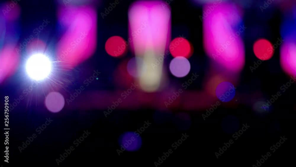 Blurred colorful blinker lights flashes effects background night scene in party night club music festival concert on the stage. Blurred colorful blinker lights flashes effects background night scene in party night club music festival concert on the stage.