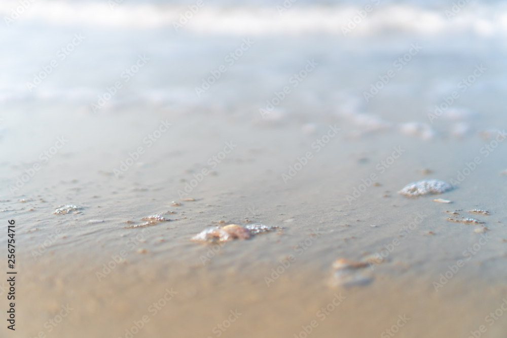 Tropical nature clean beach and white sand in summer with sun light blue sky and bokeh background. Tropical nature clean beach and white sand in summer with sun light blue sky and bokeh background.