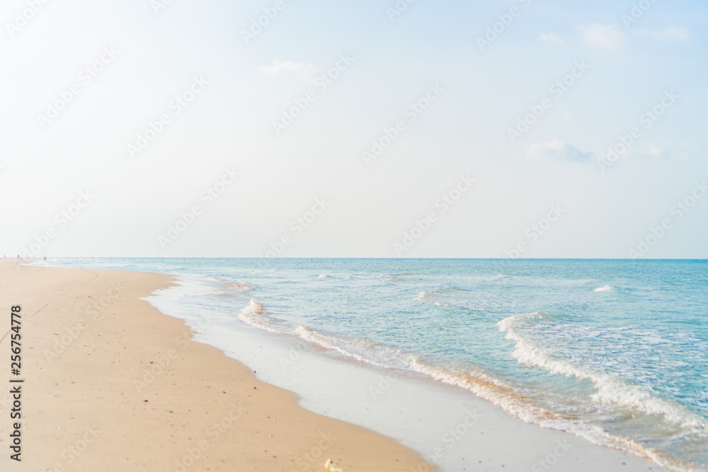 Tropical nature clean beach and white sand in summer with sun light blue sky and bokeh background. Tropical nature clean beach and white sand in summer with sun light blue sky and bokeh background.