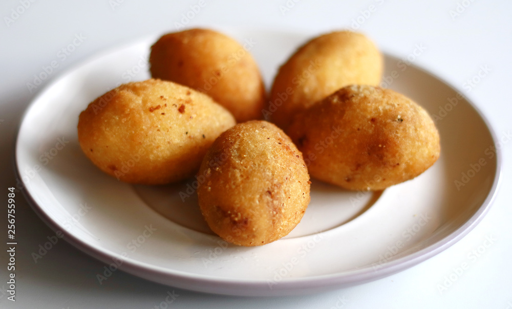 Combro, Indonesian traditional food. Made from cassava is grated and contain oncom sauce. ( Combro, Indonesian traditional food. Made from cassava is grated and contain oncom sauce. (