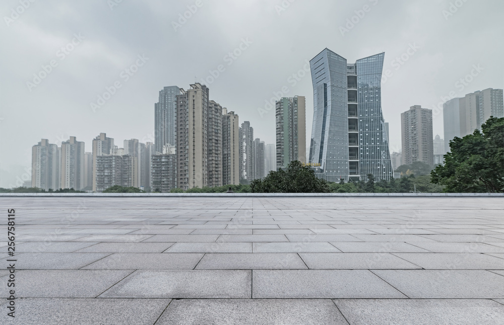 empty brick floor and cityscape of modern city near empty brick floor and cityscape of modern city near