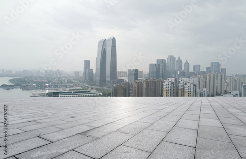 empty brick floor and cityscape of modern city near , shuzhou, © snvv