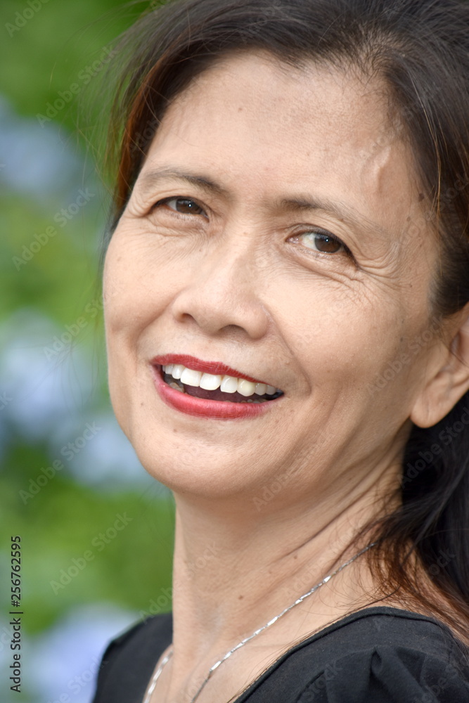 Minority Female Senior Smiling Minority Female Senior Smiling