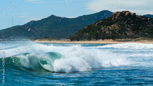 Huge wave on the blue sea