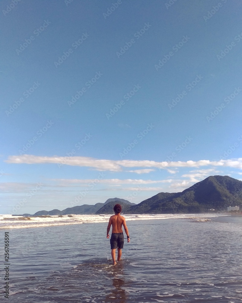 woman walking on the beach