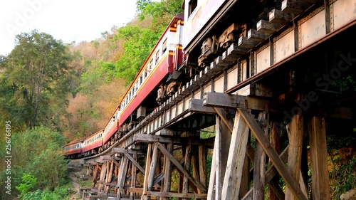 trainst passing death railway in kanchanaburi thailand