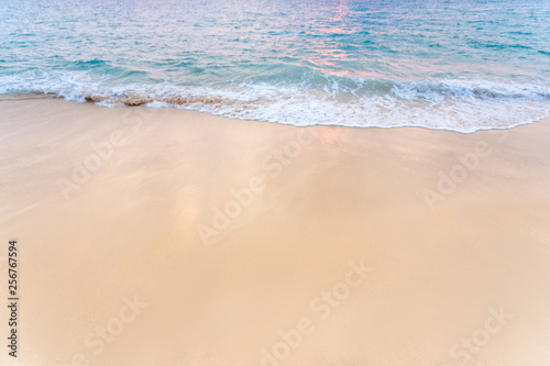 soft seashore with small wave come up, get some sunset light on there - have space for text