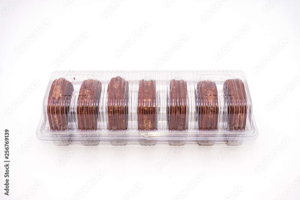 Chocolate covered round biscuits. Chocolate Covered Marshmallow Biscuits. Whole chocolate rice cake isolated on white background Chocolate covered round biscuits. Chocolate Covered Marshmallow Biscuits. Whole chocolate rice cake isolated on white background