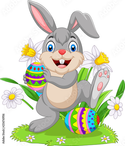 Easter bunny with decorated eggs 