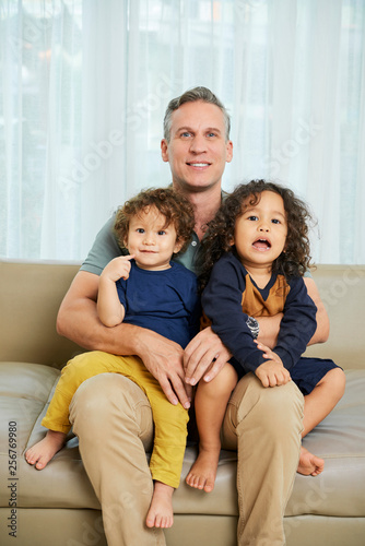 Cheerful father and children