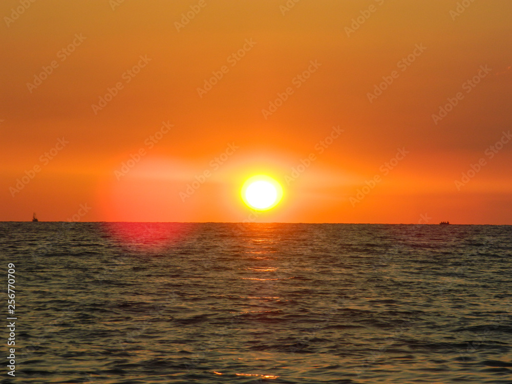 sunset, sea, sun, ocean, sky, water, sunrise, beach, orange, nature, horizon, cloud, clouds, evening, landscape, beautiful, dusk, coast, reflection, waves, light, yellow, dawn, red, morning