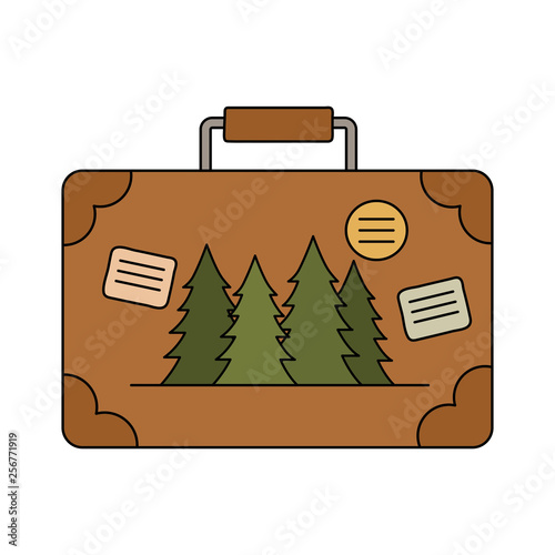 suitcase travel with pines forest